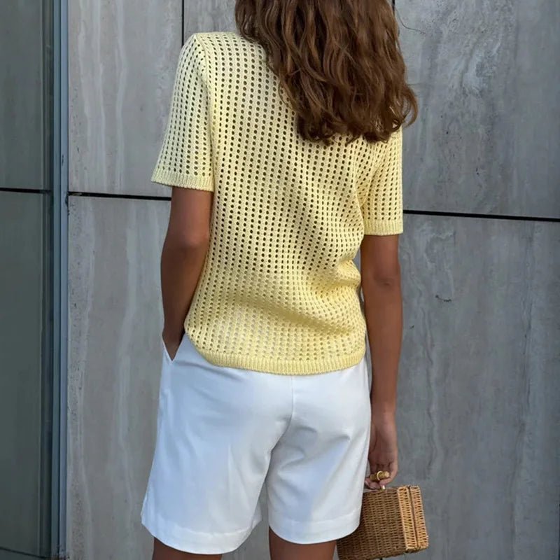 Adeline gebreide poloblouse met uitsparingen