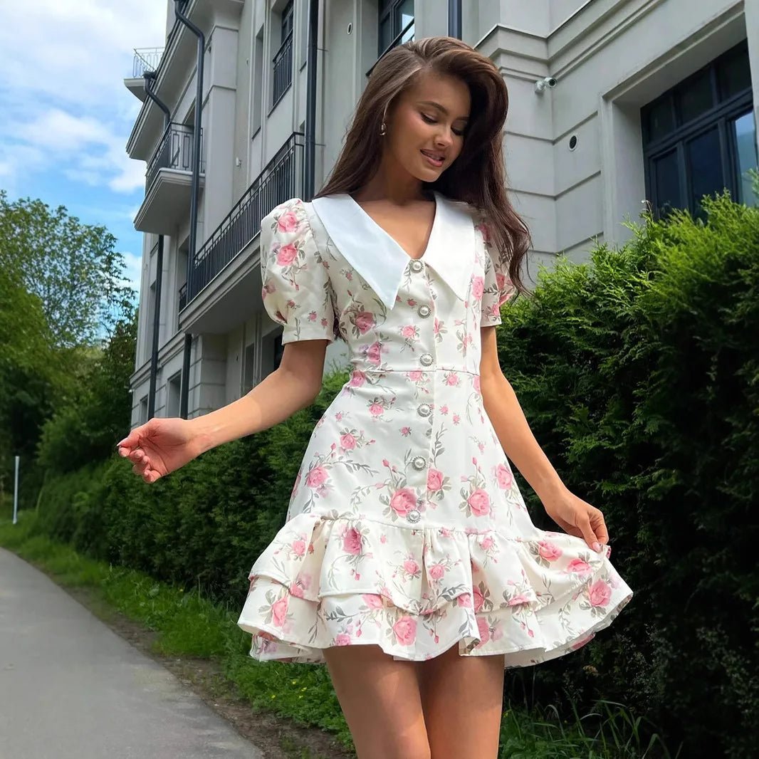 Andromeda mini-jurk met bloemenprint en pofmouwen