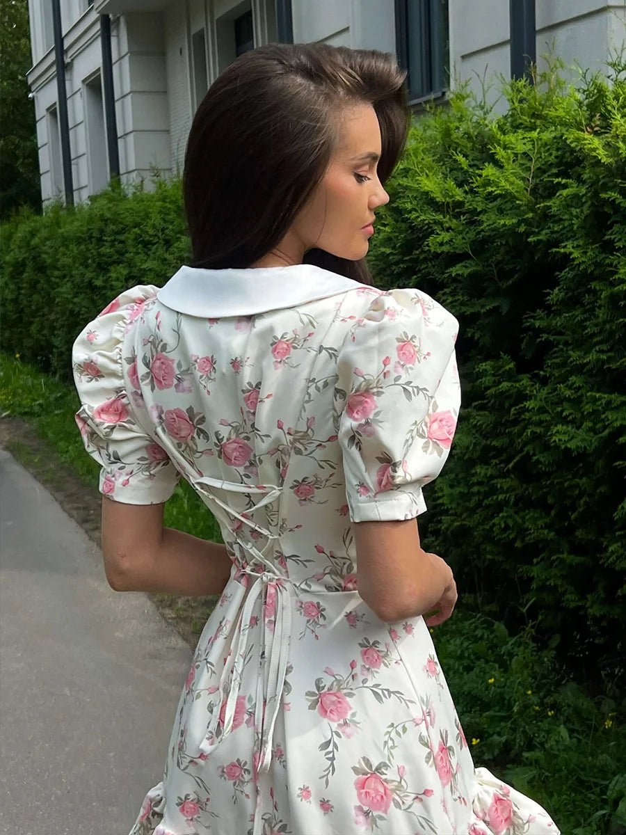Andromeda mini-jurk met bloemenprint en pofmouwen