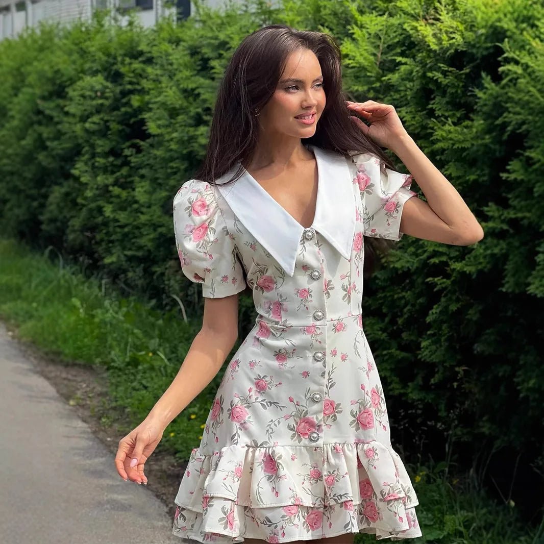 Andromeda mini-jurk met bloemenprint en pofmouwen