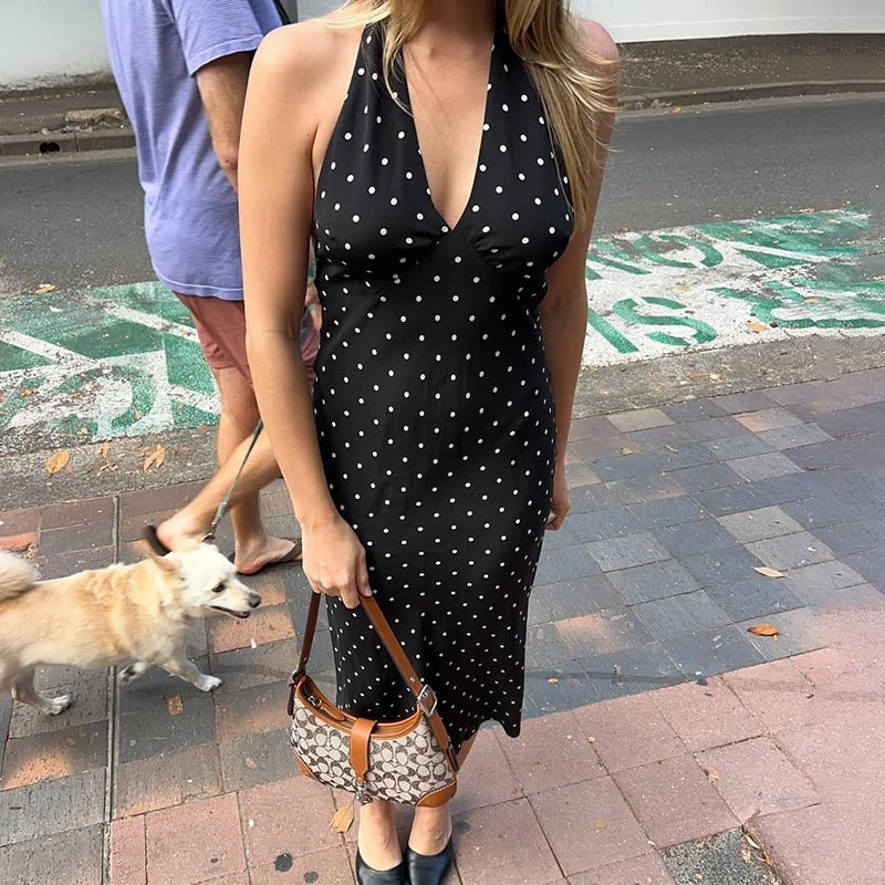 Bianca haltermaxijurk met stippen