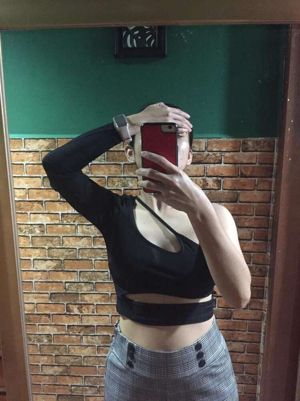 Celeste asymmetrische crop-top met uitsparingen