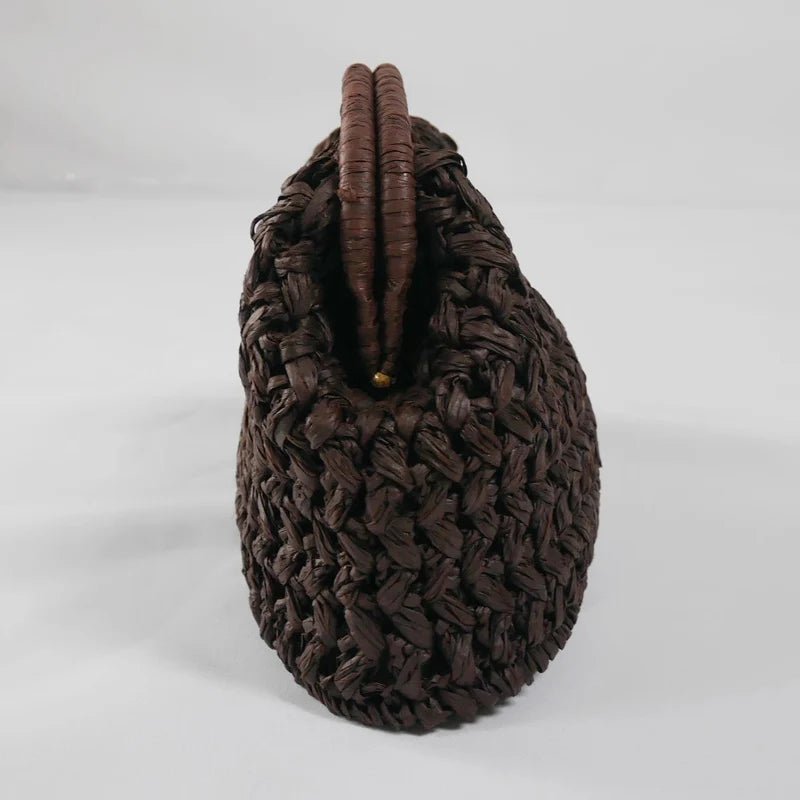 Celeste gevlochten strooien schelpclutch