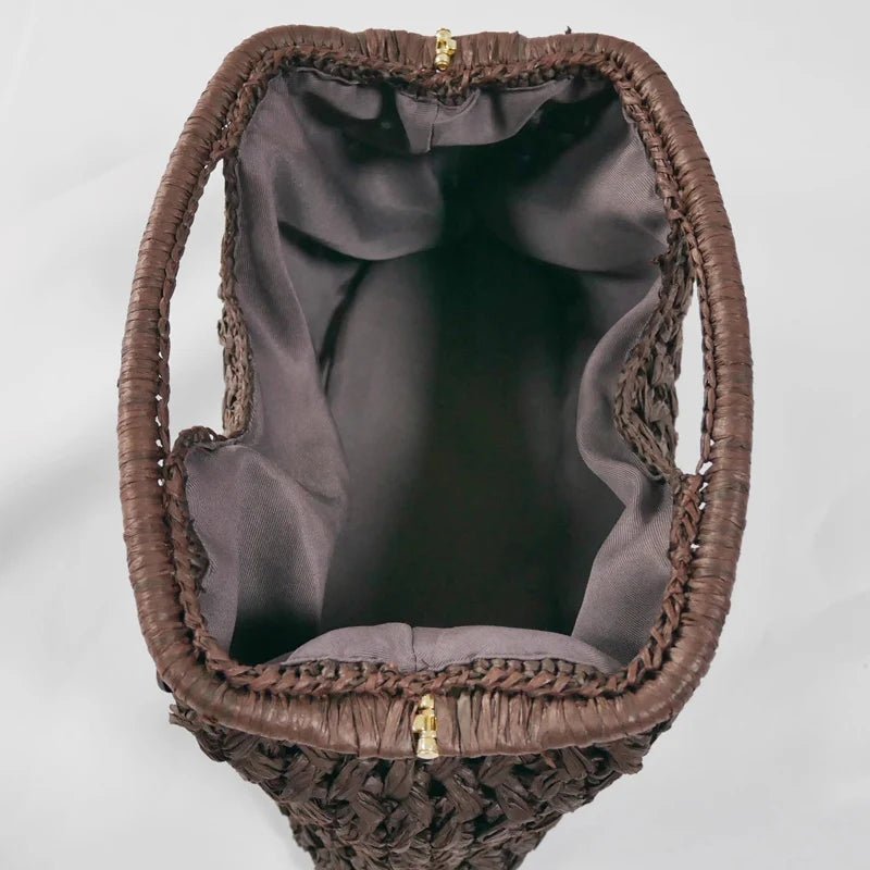 Celeste gevlochten strooien schelpclutch