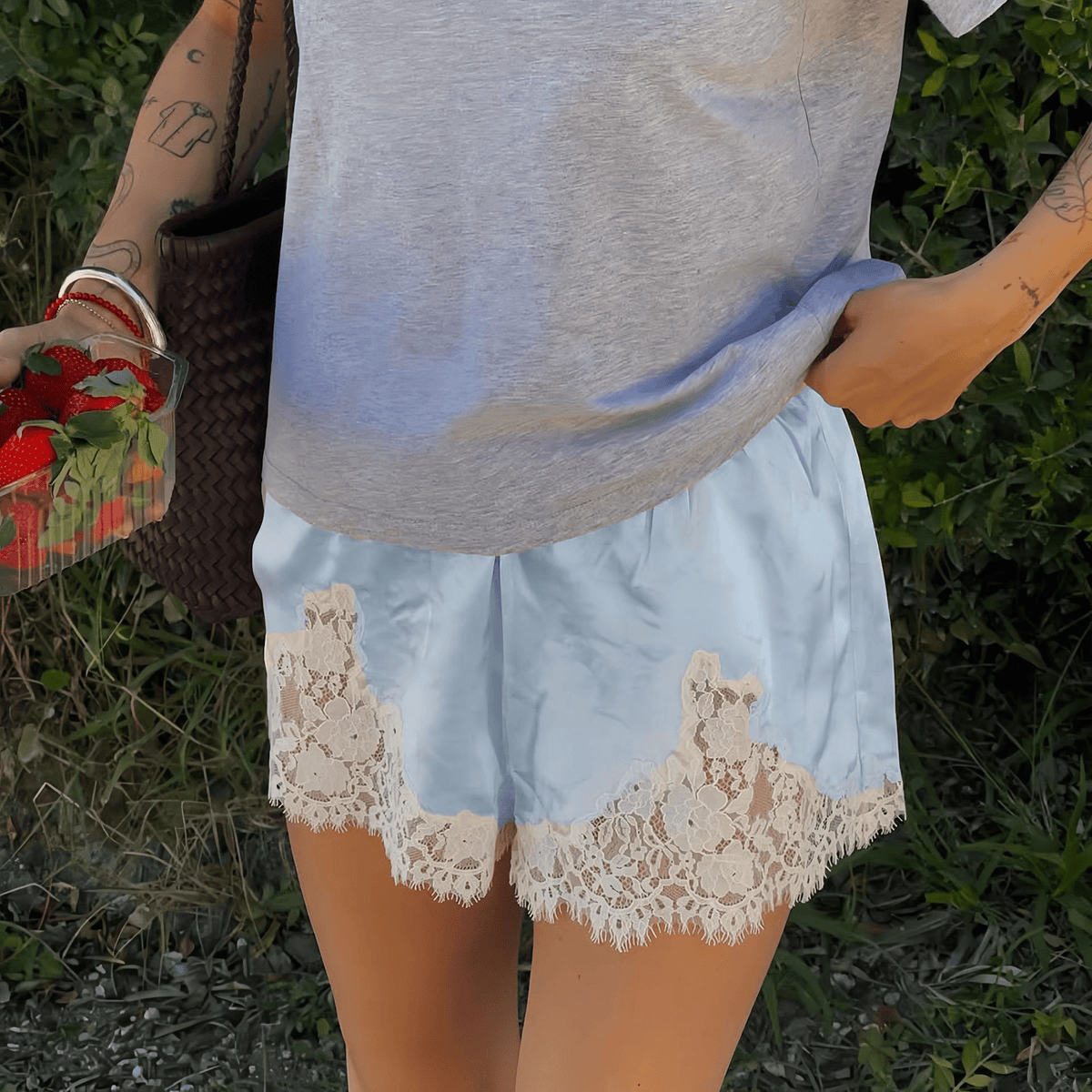 Satin-finish shorts with lace trim