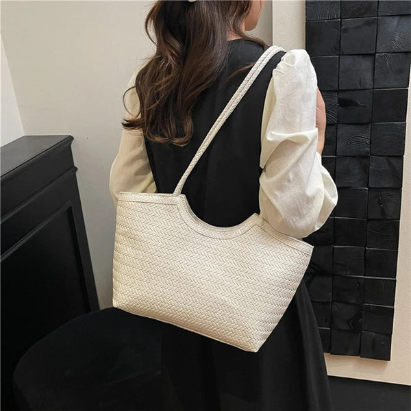 Elena handtas met textuurweefsel