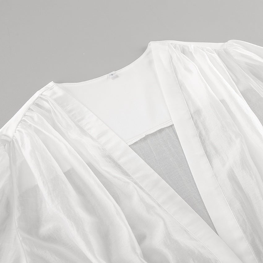 Elisa doorschijnende blouse met knopen en diepe hals