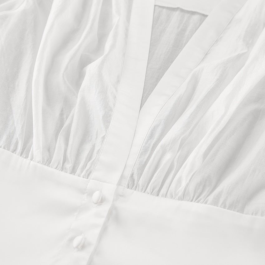 Elisa doorschijnende blouse met knopen en diepe hals