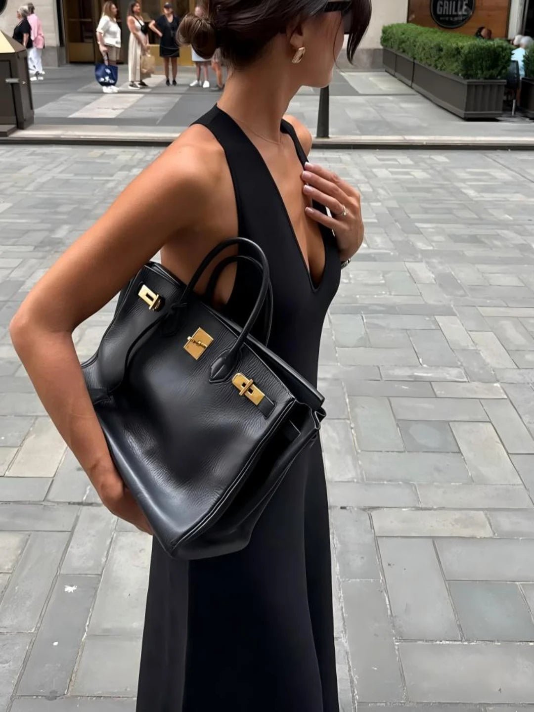 Erica maxi-jurk met diepe V-hals en halternek