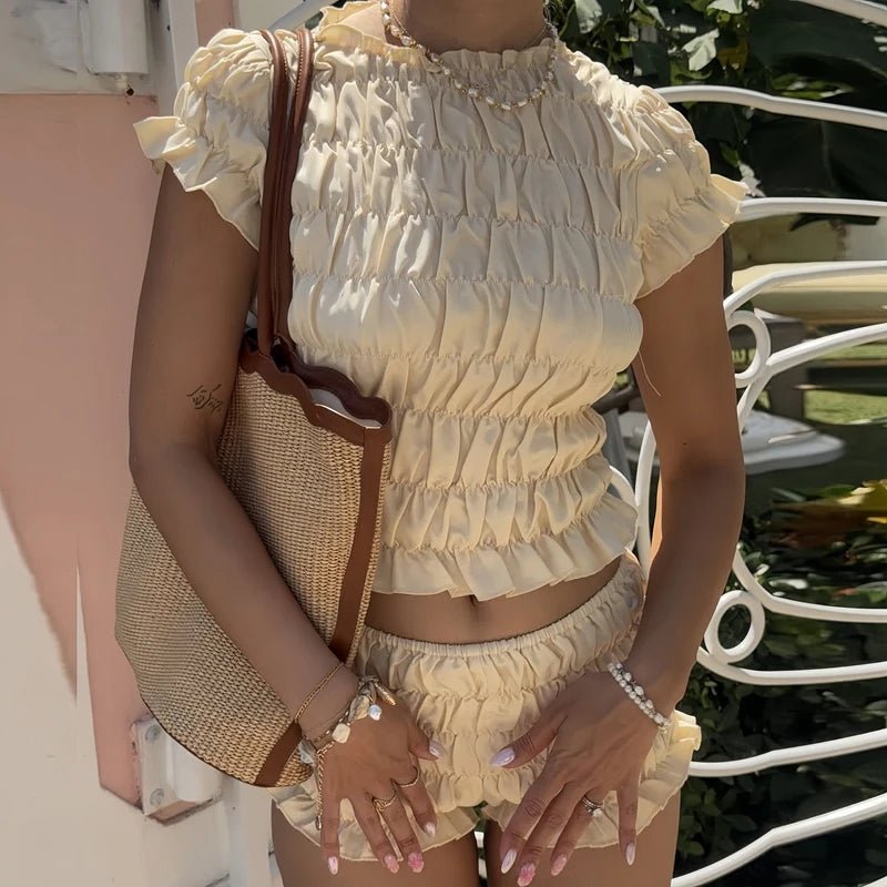 Hanna Korte set met elastische smokwerkdetails