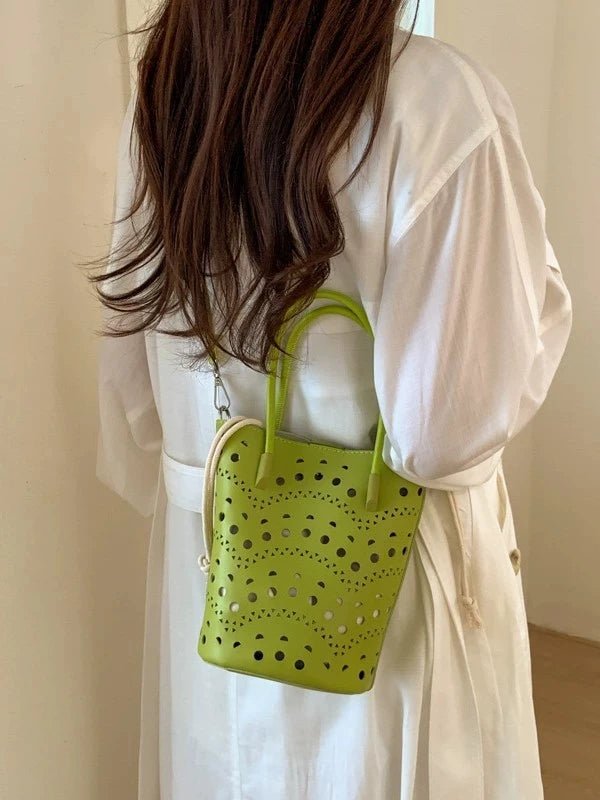 Lara bucketbag met uitsparingen