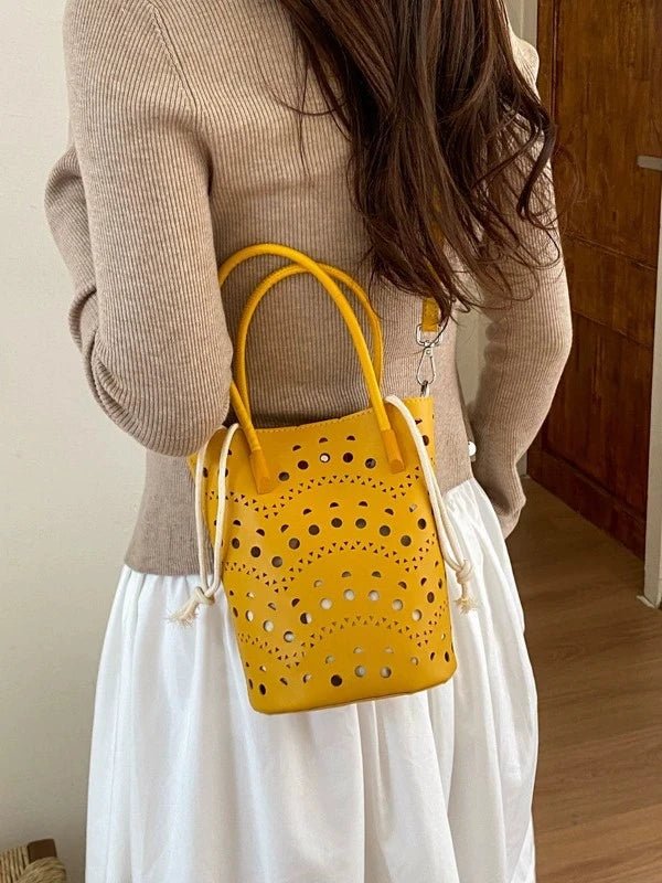 Lara bucketbag met uitsparingen