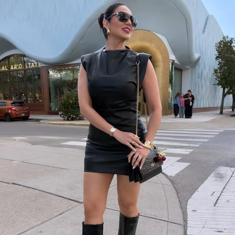 Vita mouwloze mini-jurk in leerlook