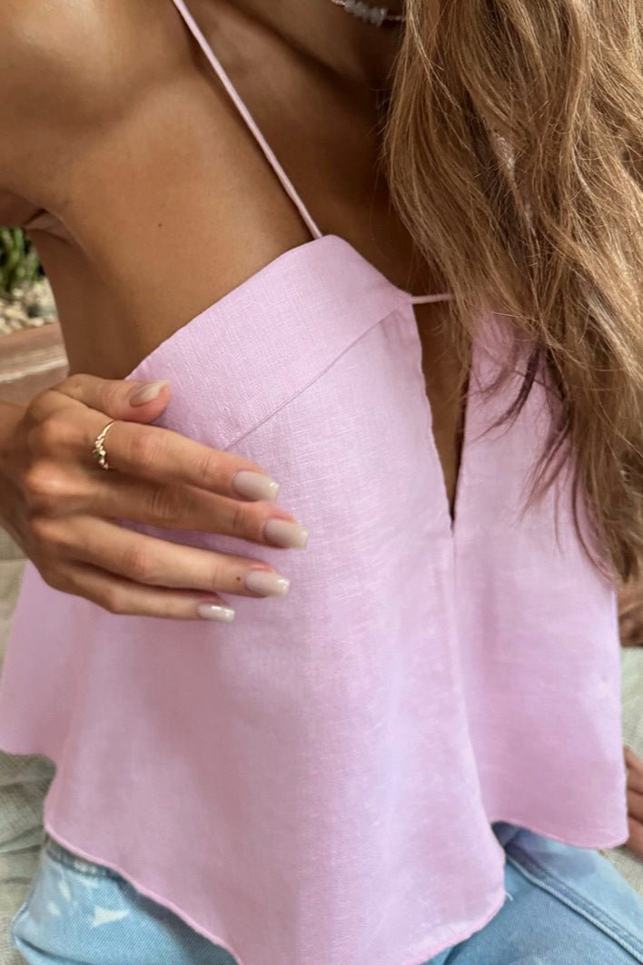 Losse crop top met uitsparingen en spaghettibandjes