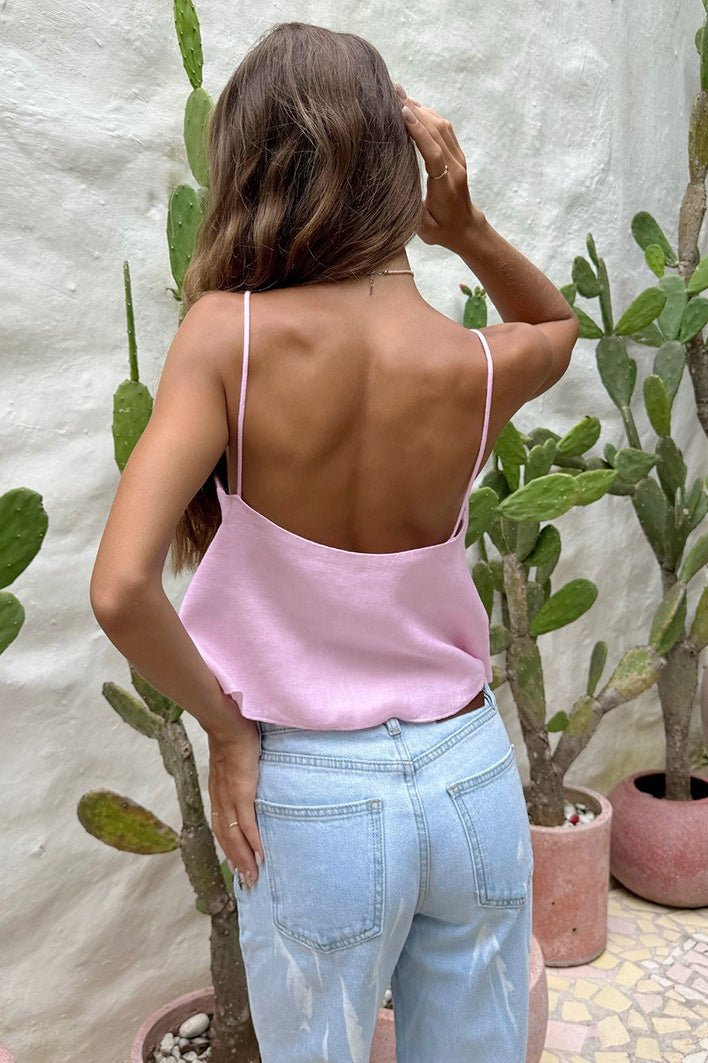 Losse crop top met uitsparingen en spaghettibandjes