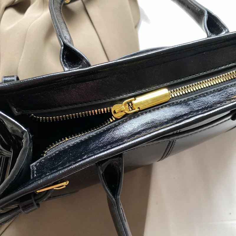 Luna schoudertas met riemdetail