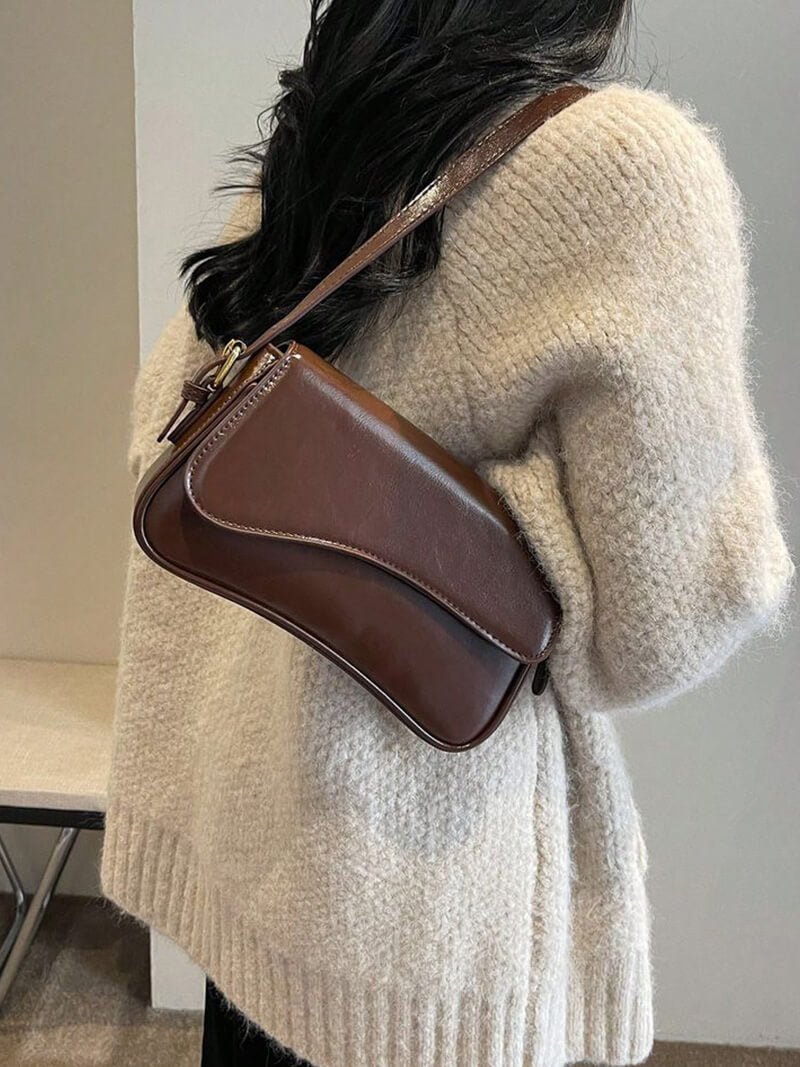 Mila schoudertas in zadelvorm