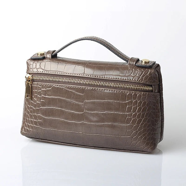 Minerva clutch met krokodillenpatroon