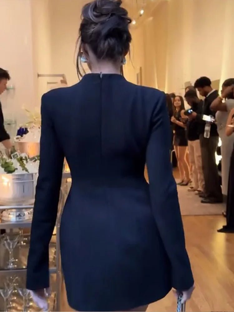 Nicole mini-jurk met uitsparingen