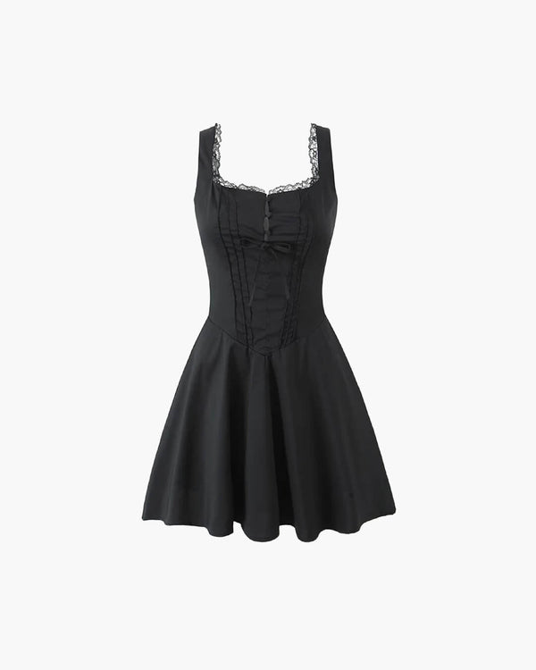 Rosa mini-jurk met veterdetail op de rug