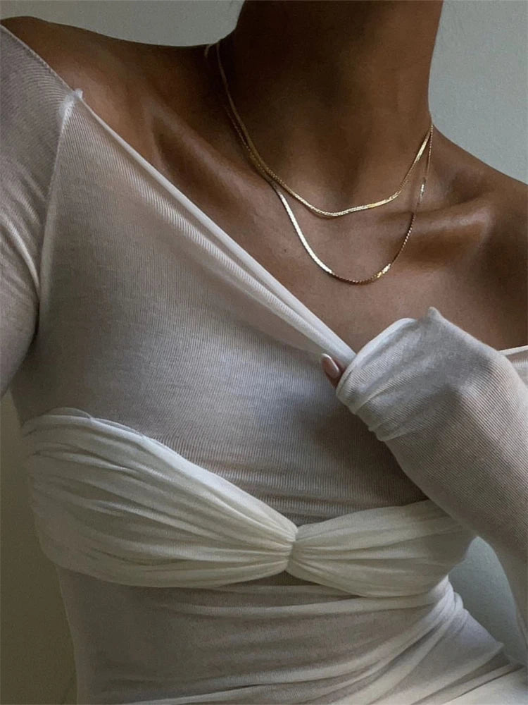 Sara transparante mesh off-shoulder top