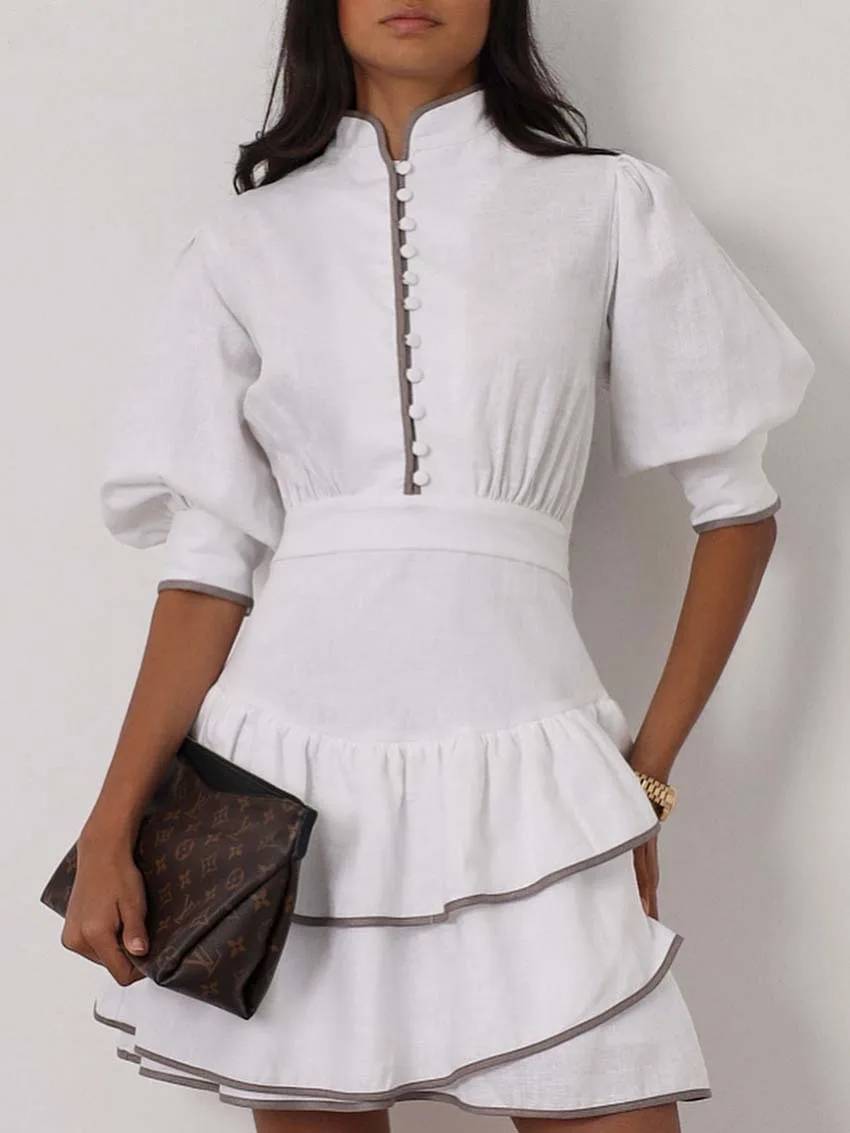 Sara mini-jurk met patchwork en col