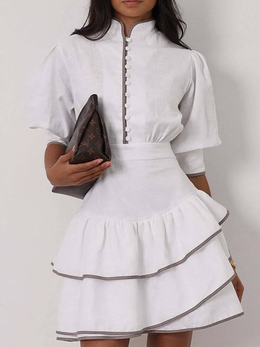 Sara mini-jurk met patchwork en col