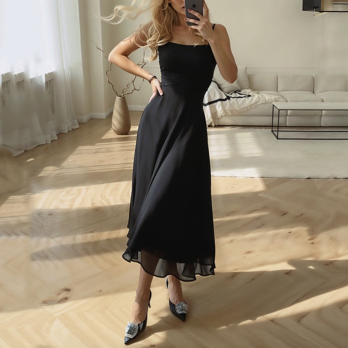 Sophia mouwloze midi-jurk