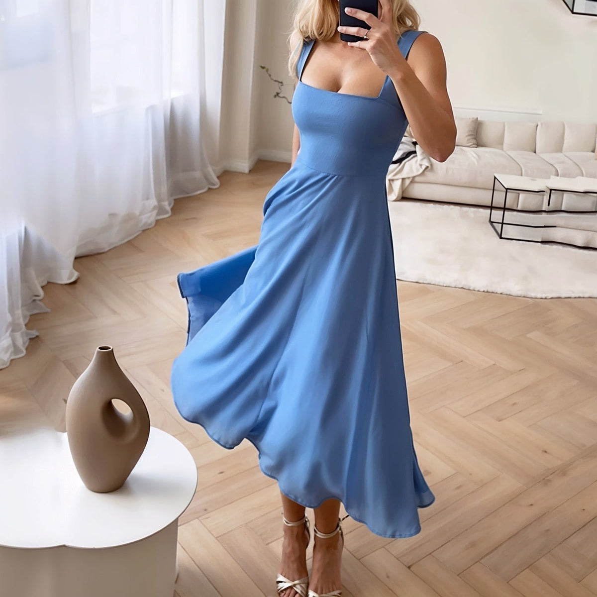 Sophia mouwloze midi-jurk
