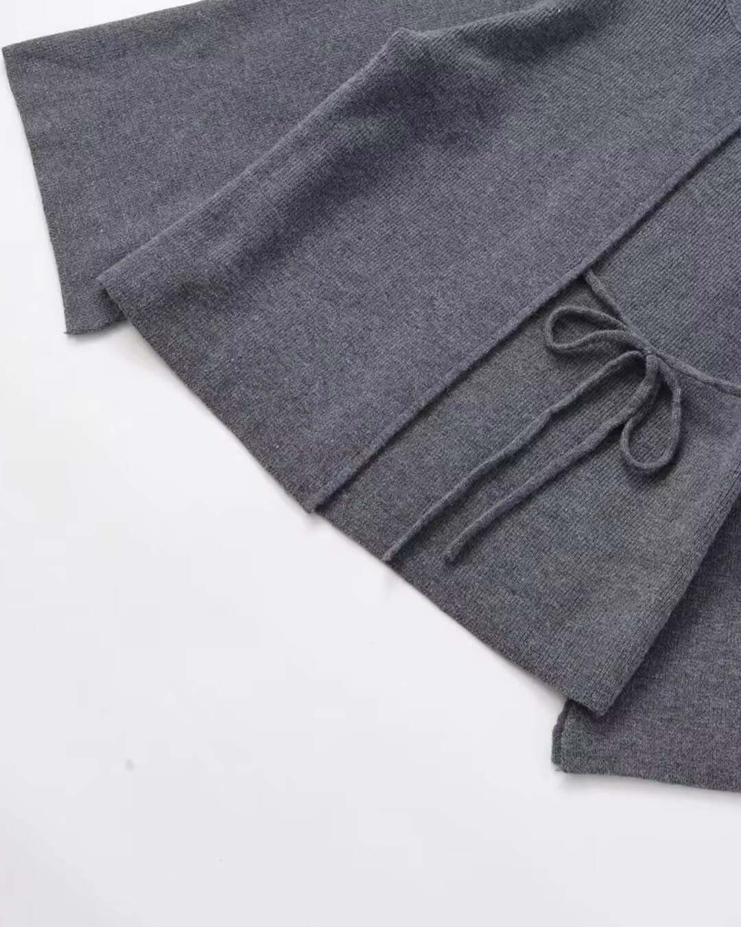 Suzette vest met vleermuismouwen en split