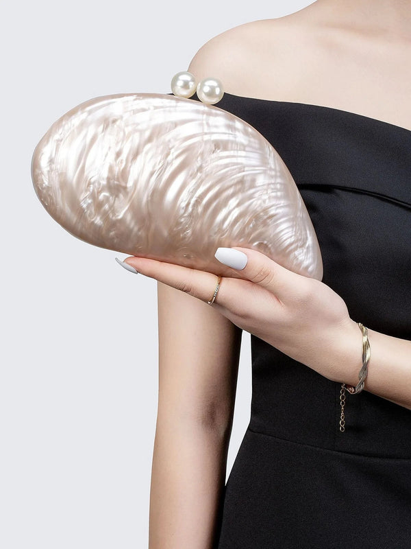 Valentina clutchtas in schelpvorm