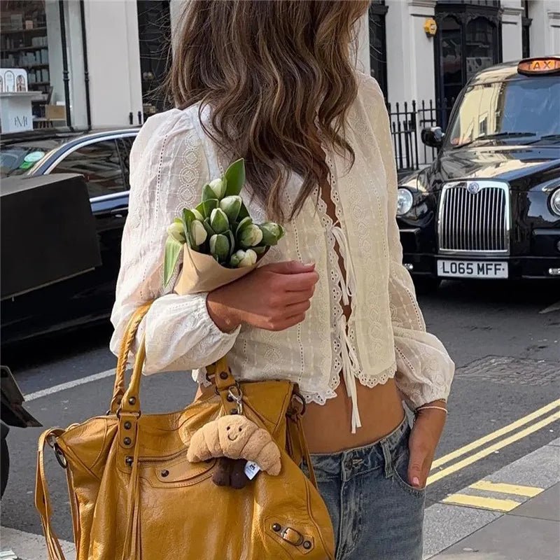 Vesna boho-vest met borduursels en striksluiting